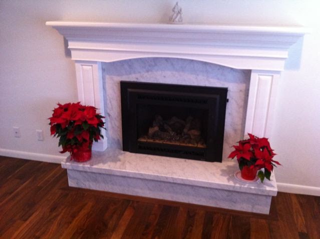 the granite gurus  carrara marble fireplace by mgs by design