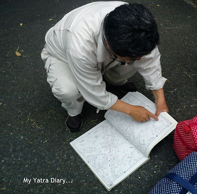 A Japanese man helping us locate our hotel in Tokyo