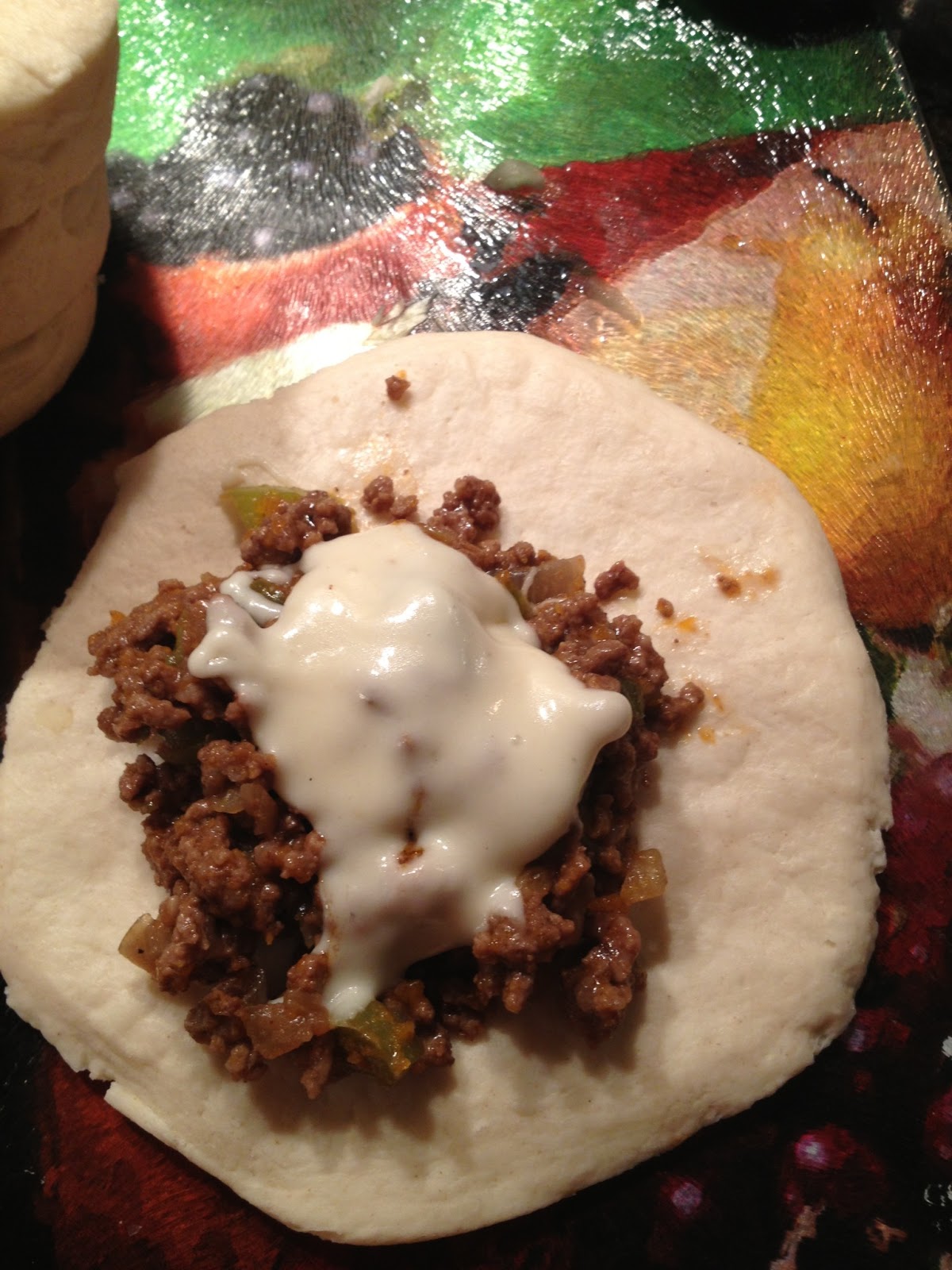 Always Just a Bite Philly Cheese Empanadas with Cream Sauce