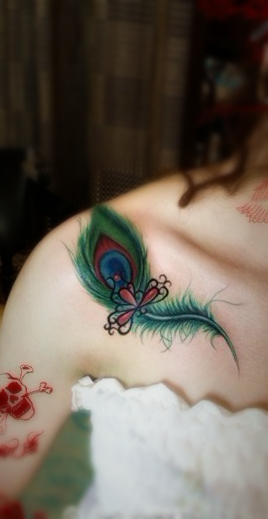  colorful peacock feather tattoos on the shoulder -1