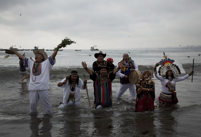 worshippers in the river praying to god