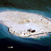 China construye isla en aguas en disputa