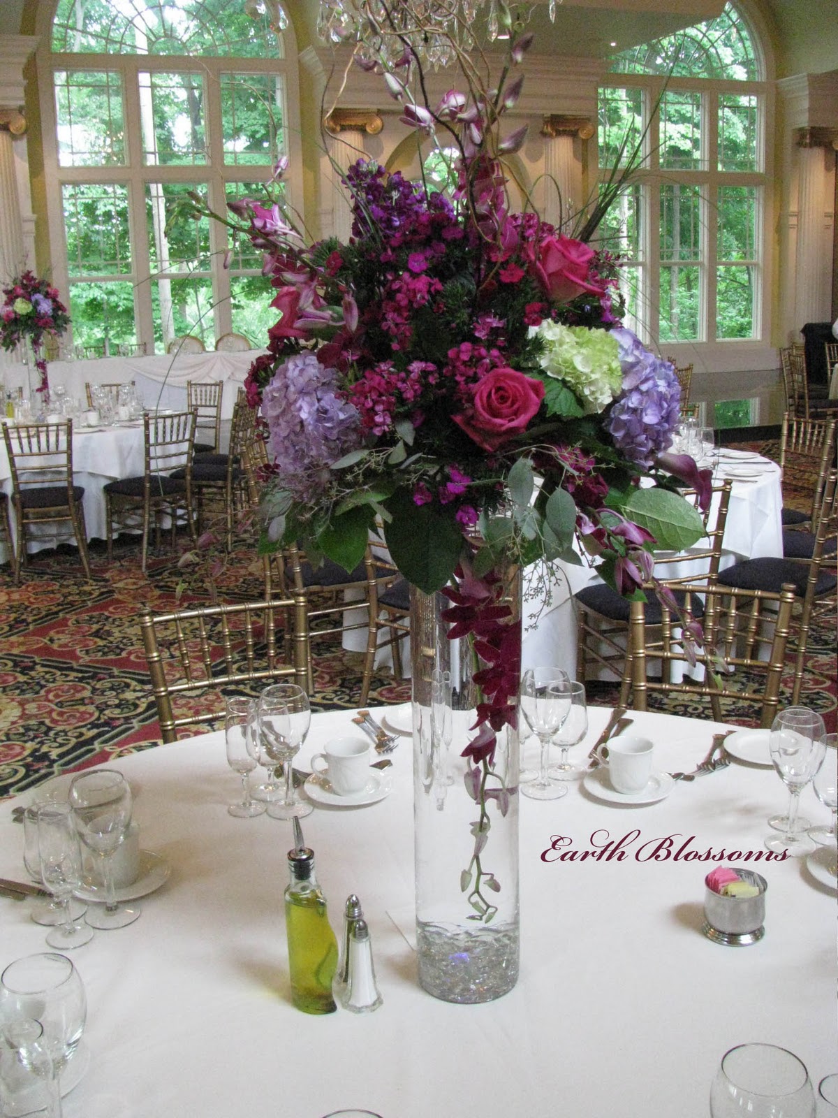 Earth Blossoms Flowers Pedestal Centerpieces a floral journey from