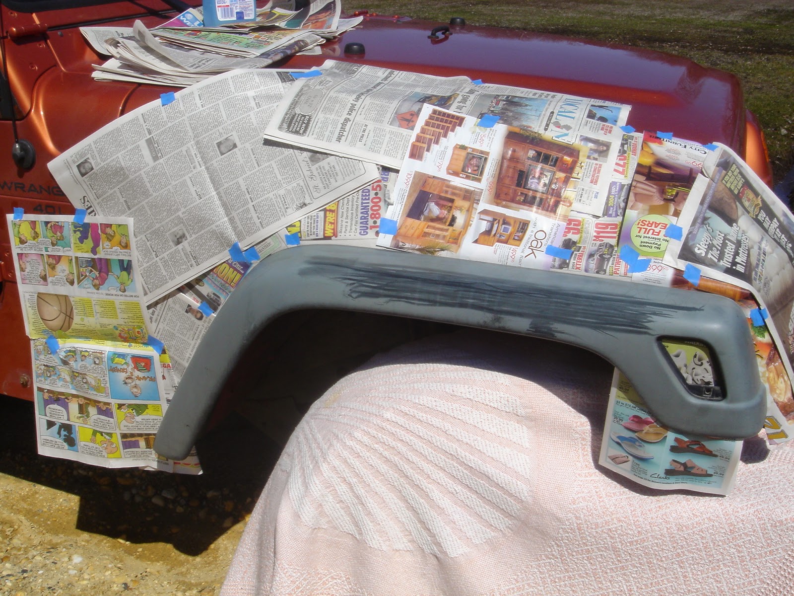 JeepGuide Krylon Fusion On Faded Fender Flares