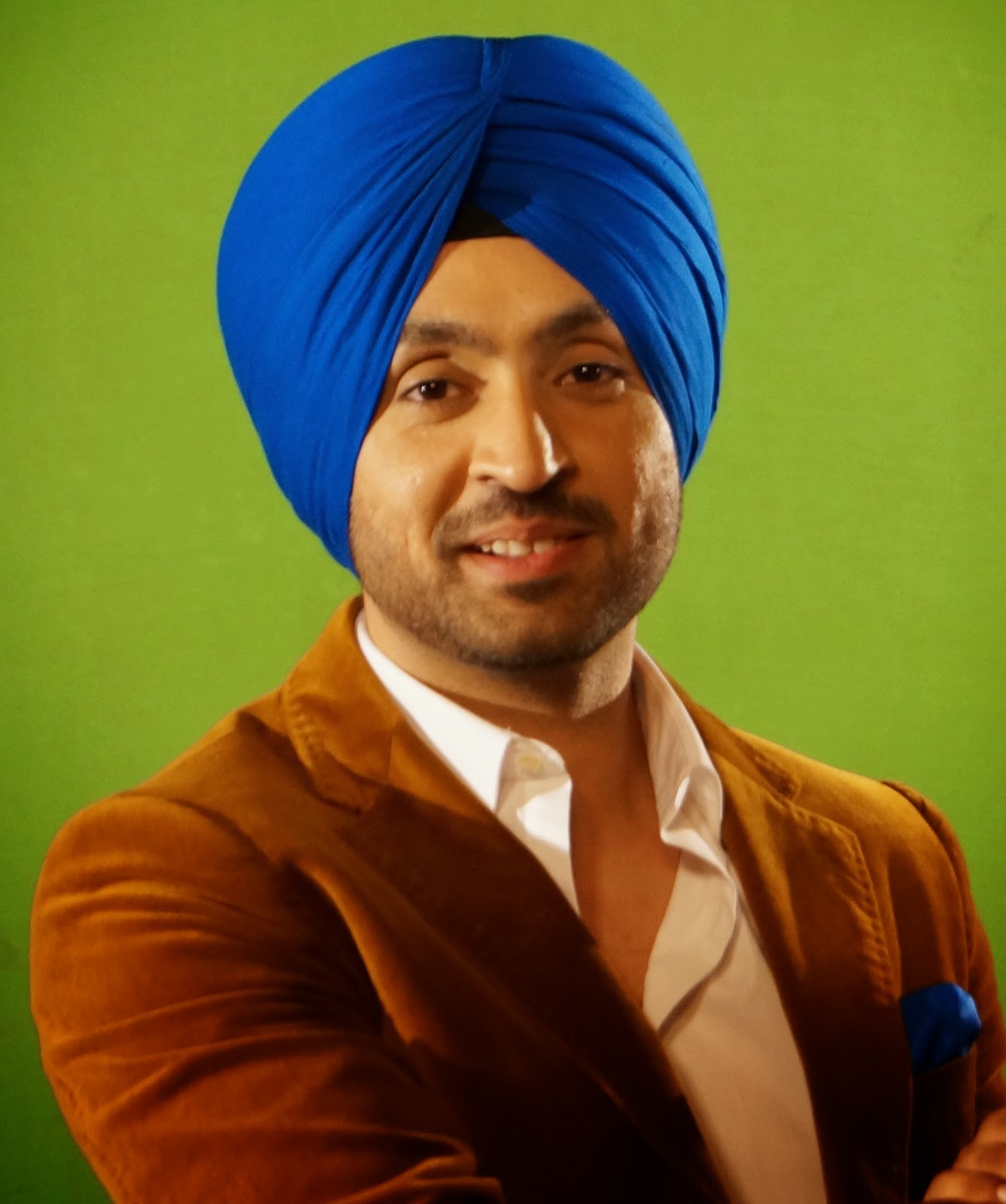 Sytlish Diljit Dosanjh in semi formal outfit during a shoot in Delhi