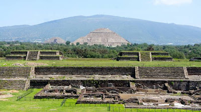 Pyramid of the Sun in Teotihuacan — Mexico Pyramid of the Sun, It was massive, one of the first great cities of the Western Hemisphere. And its origins are a mystery. It was built by hand more than a thousand years before the swooping arrival of the Nahuatl-speaking Aztec in central Mexico. But it was the Aztec, descending on the abandoned site, no doubt falling awestruck by what they saw, who gave it a name: Teotihuacan. A famed archaeological site located fewer than 30 miles (50 kilometers) from Mexico City, Teotihuacan reached its zenith between 100 B.C. and A.D. 650. It covered 8 square miles (21 square kilometers) and supported a population of a hundred thousand, according to George Cowgill, an archaeologist at Arizona State University and a National Geographic Society grantee.