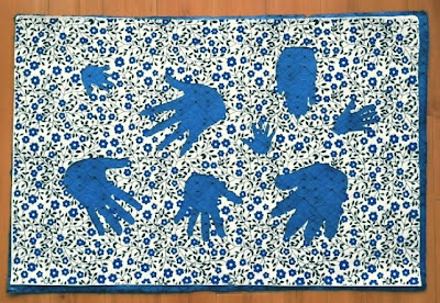 using paper from Paper Source cut out hands Garden Flowers Blue paper, placing it over Blue Modern Wave paper