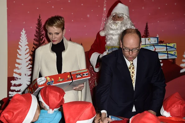 Prince Albert II of Monaco and Princess Charlene of Monaco, Camille Gottlieb and Louis Ducruet attend the Christmas gifts distribution