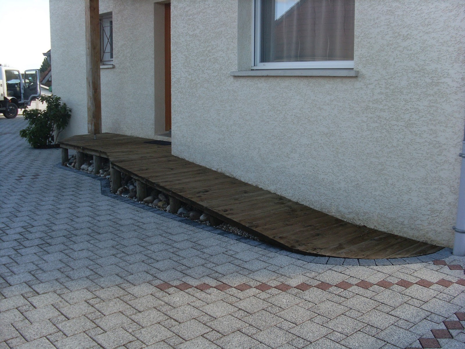 HERVIER PAYSAGES: Rampe en bois