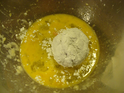 scotch egg in egg wash