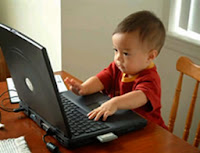 Baby using computer