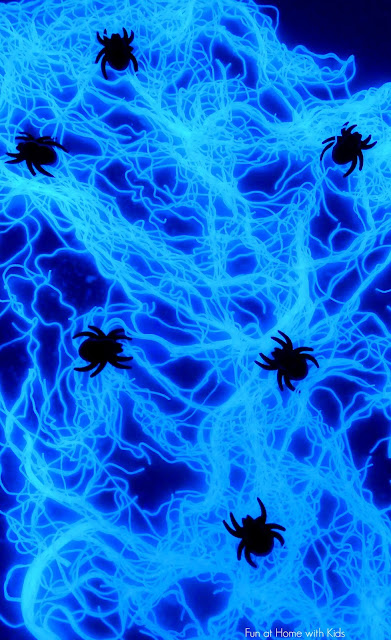 Edible Glowing Spiderwebs Sensory Play from Fun at Home with Kids