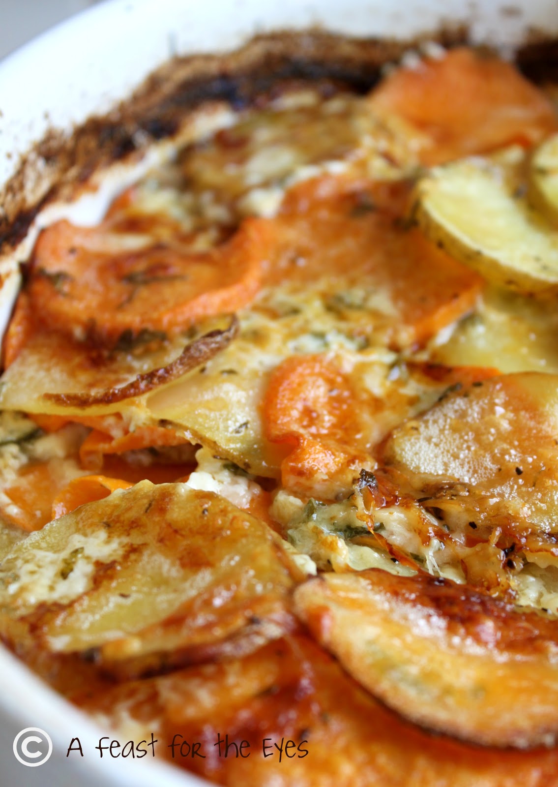 Scalloped Yukon Gold and Sweet Potato Gratin with Fresh Herbs A Feast