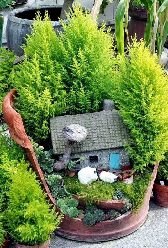 Small Gardens Ideas small garden home design ideas renovations amp photos with regard to small garden ideas source Garden Ideas For Small Gardens Old Flower Pot Plant Moss And Stone Cottage Small Gardens Ideas a fusion courtyard Garden Ideas For Small Gardens Old Flower Pot Plant Moss And Stone Cottage