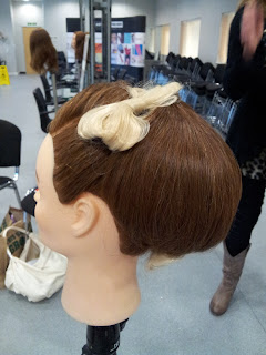 Chic Bun on a sally head by hairdresser Anne Veck