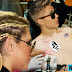 What if Ke$ha gave Justin Bieber a birthday tattoo?