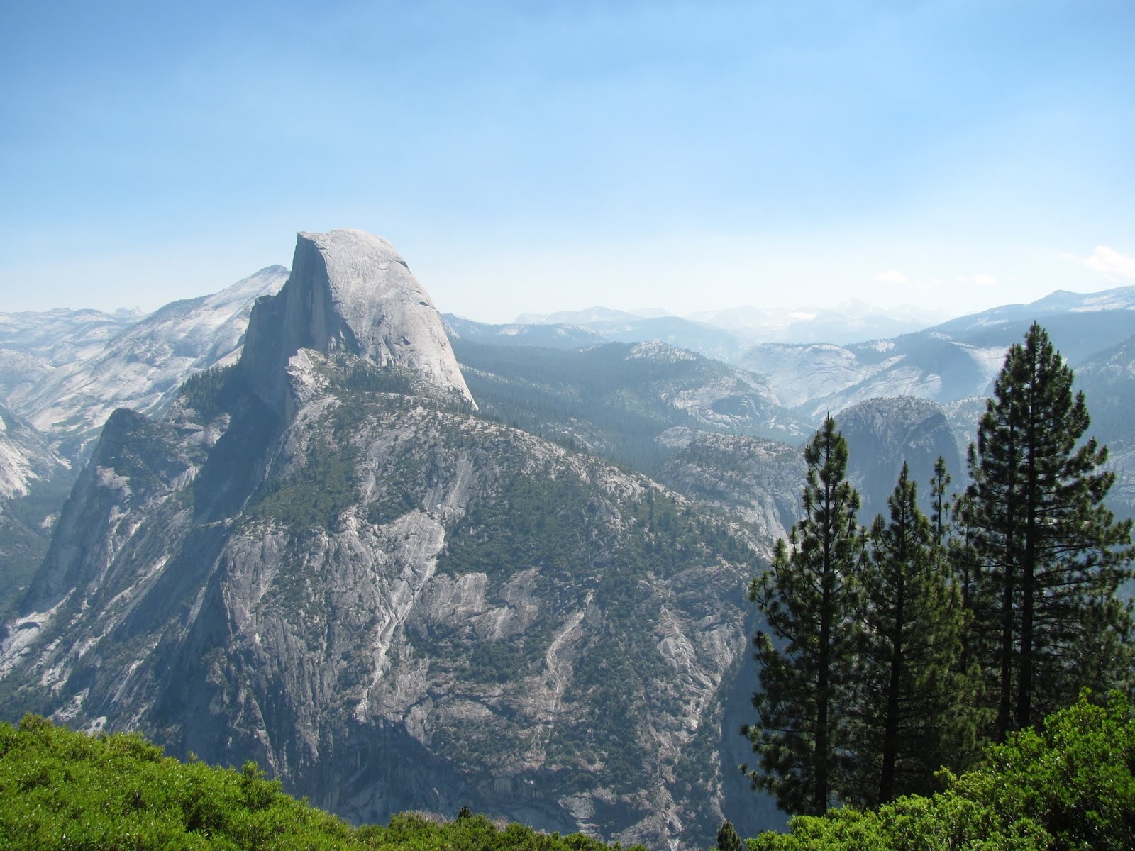 Half Dome from Glacier Point The Yosemite Valley is seen from the top of Glacier Point at Yosemite National Park, California