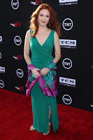 Amy Yasbeck glamorous in a green dress