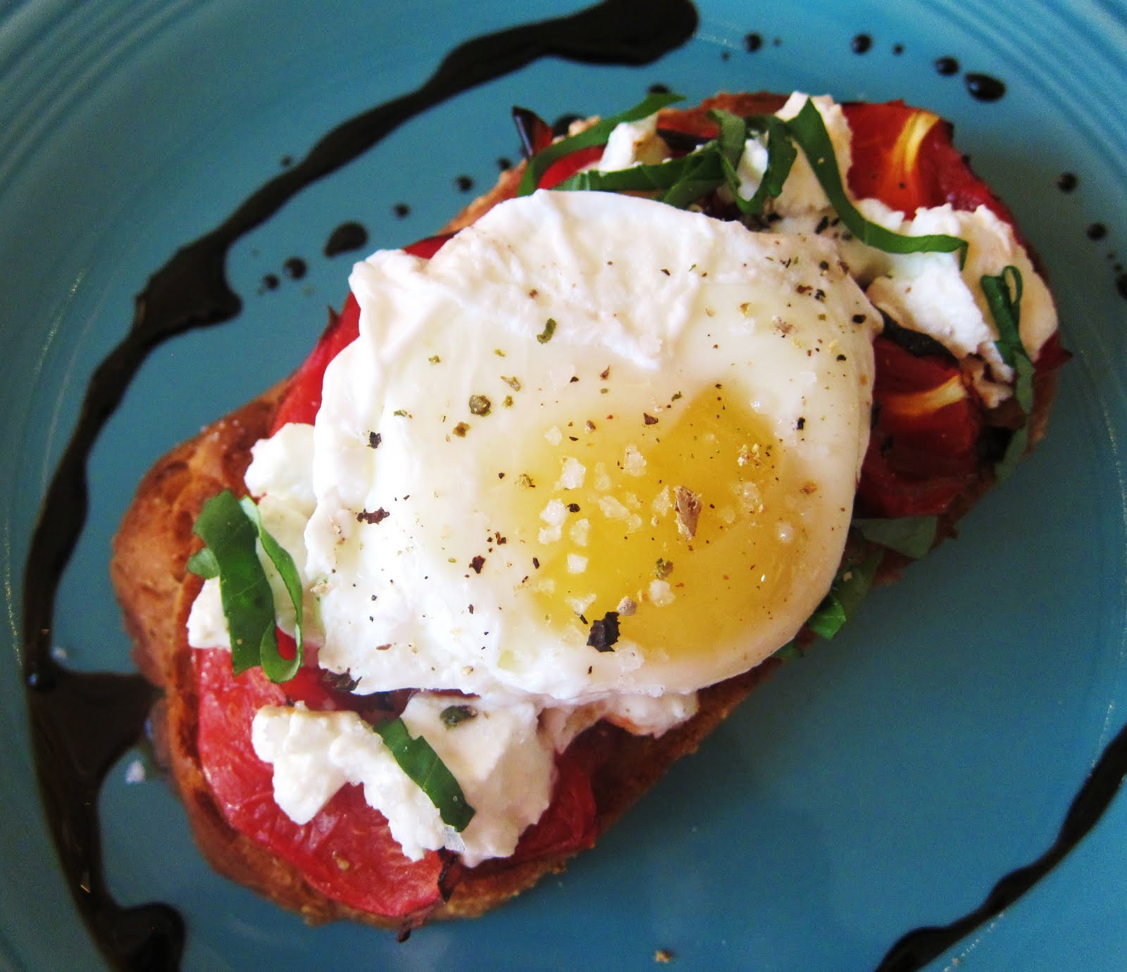 Garlic and Sea Salt Roasted Tomatoes on Toast with Chevre, Poached Egg