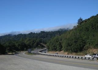 Old Santa Cruz Highway parallels Highway 17, with fog capping the top of the Santa Cruz Mountains
