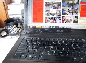 Laptop computer, showing a magazine in the process of being laid out.