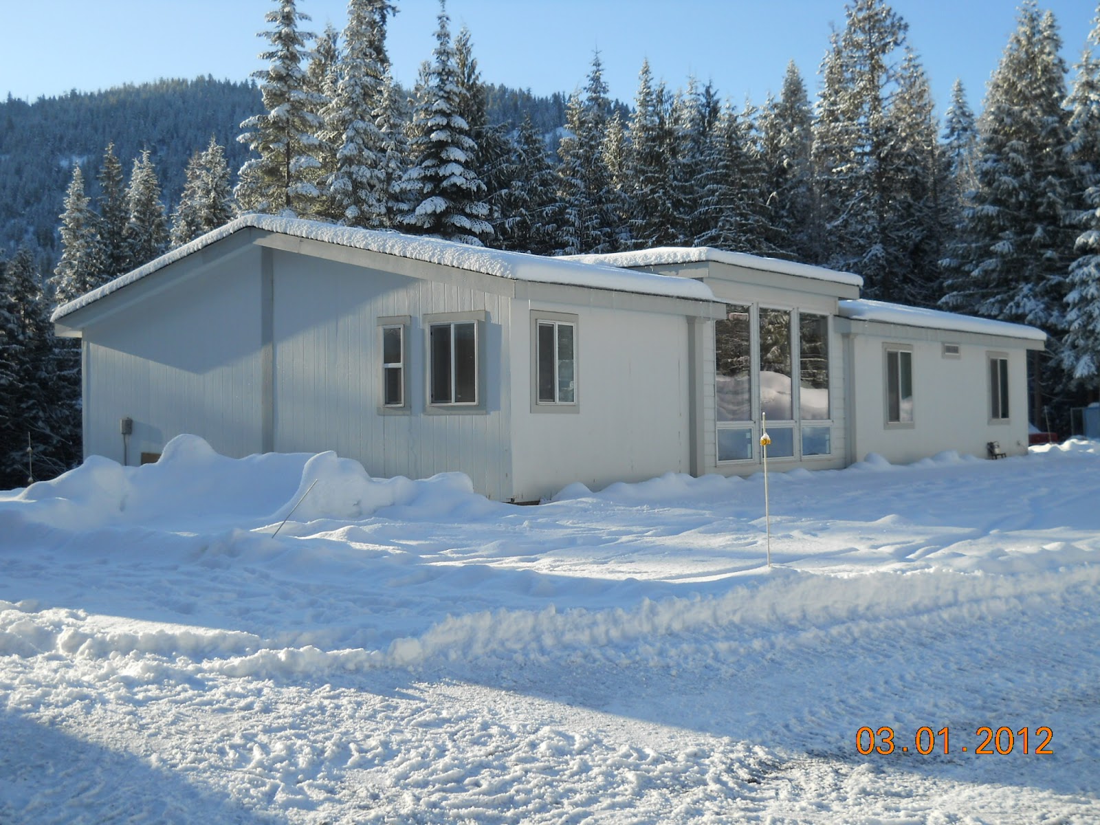 Home with three creeks for sale! Photo's of house and land