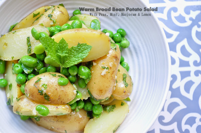 Warm broad bean potato salad with mint, peas, marjoram, lemon and garlic.
