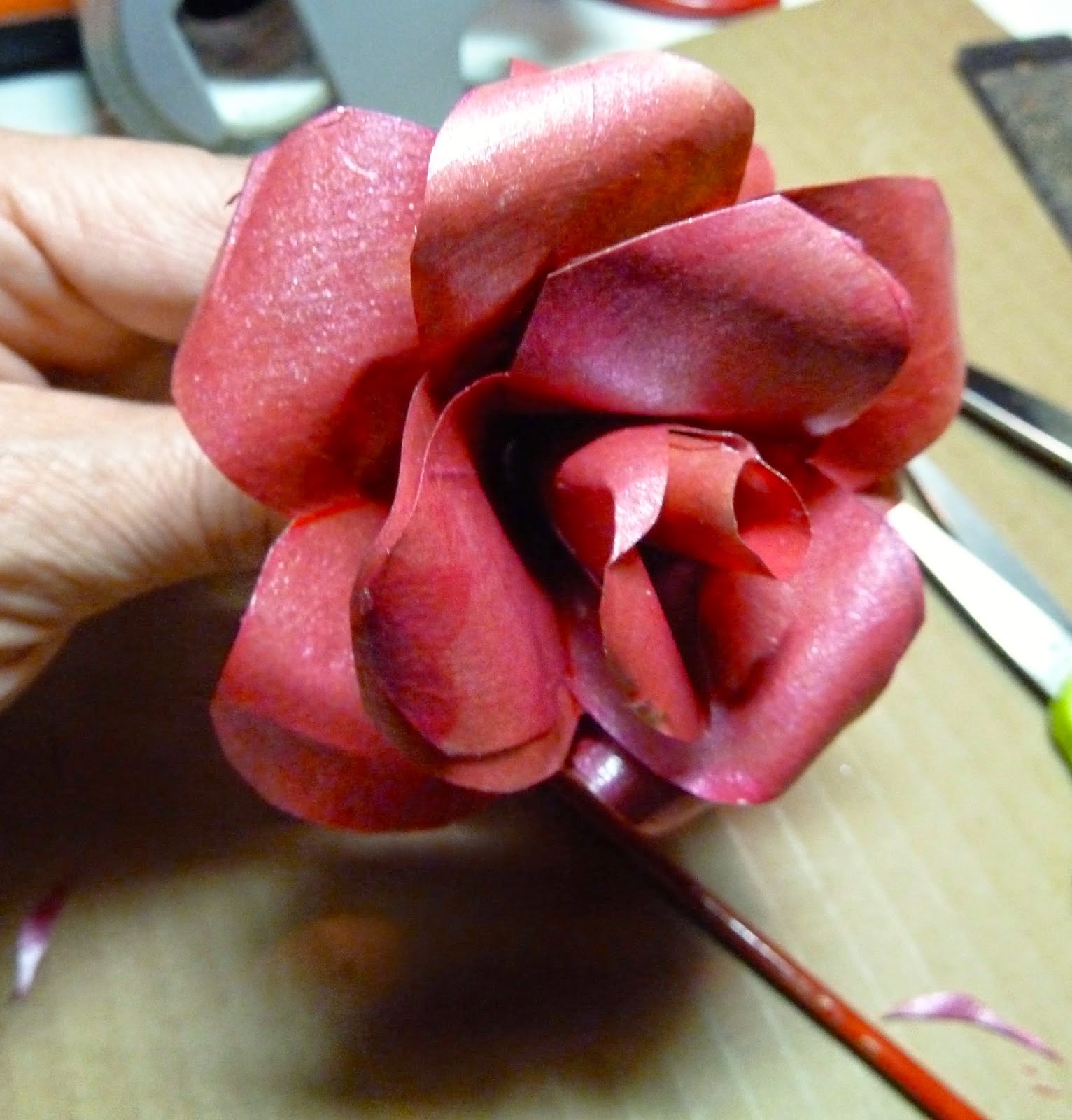 http://www.makeiteasycrafts.com/2014/04/recycled-brown-paper-bag-rose-pens.html