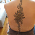 Flower tattoo on back middle body