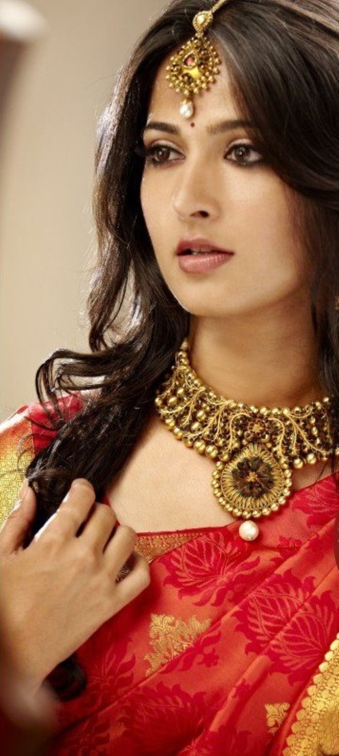 Anushka Shetty red saree, tikka, necklace - Anushka Shetty Jewellery Ad photoshoot pics