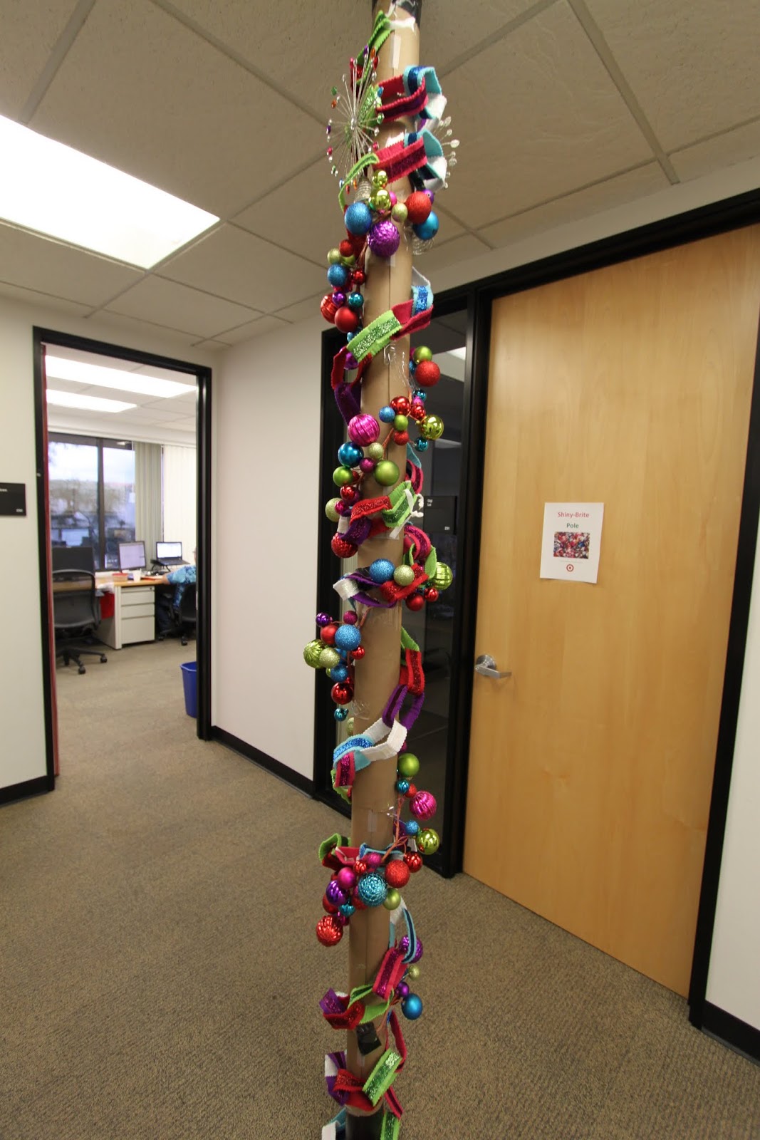 the office holiday pole decorating contest midcentury modern remodel