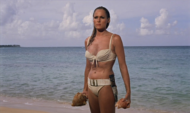 Ursulla Andress as Honey Ryder in her iconic white bikini, Honey Rider Ursulla Andress as Honey Ryder in her iconic white bikini, Honey Rider
