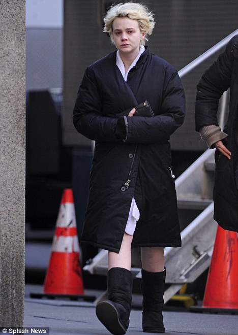 Washed out: Carey Mulligan looks washed out as she strolls around the movie 