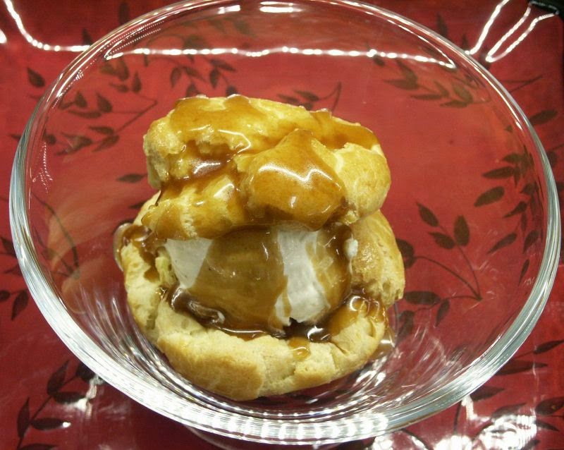 Moveable Feasts Profiteroles with Eggnog Ice Cream and Rum Sauce