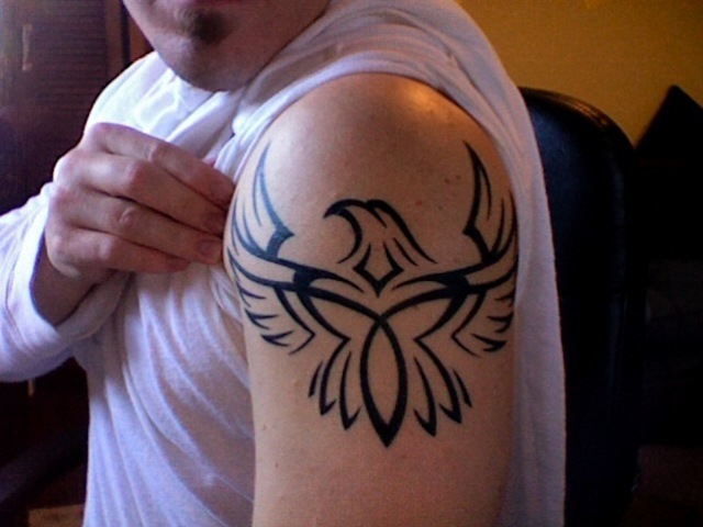Tribal Eagle Animal Tattoos Design on Arm For Men | Que la historia me