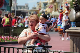 baby enjoying Disney parade