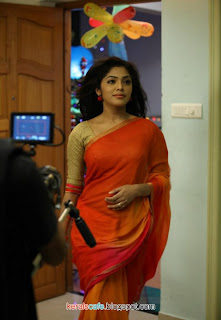 Rima Kallingal hot photos,Actress Rima Kallingal hot photoshoots stills,Download Latest rima Kllingal hot Photos & pictures,Checkout thee new collecion of Rima Kallingal photos, Rima Kallingal Latest Hot Stills