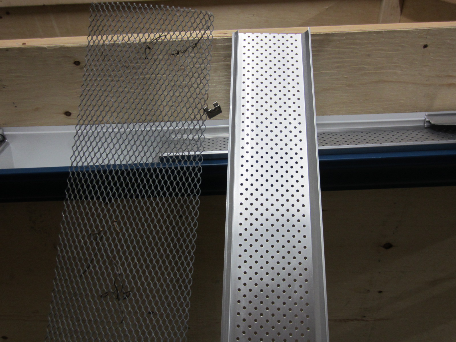 Mesh leafguard beside modern leafguard