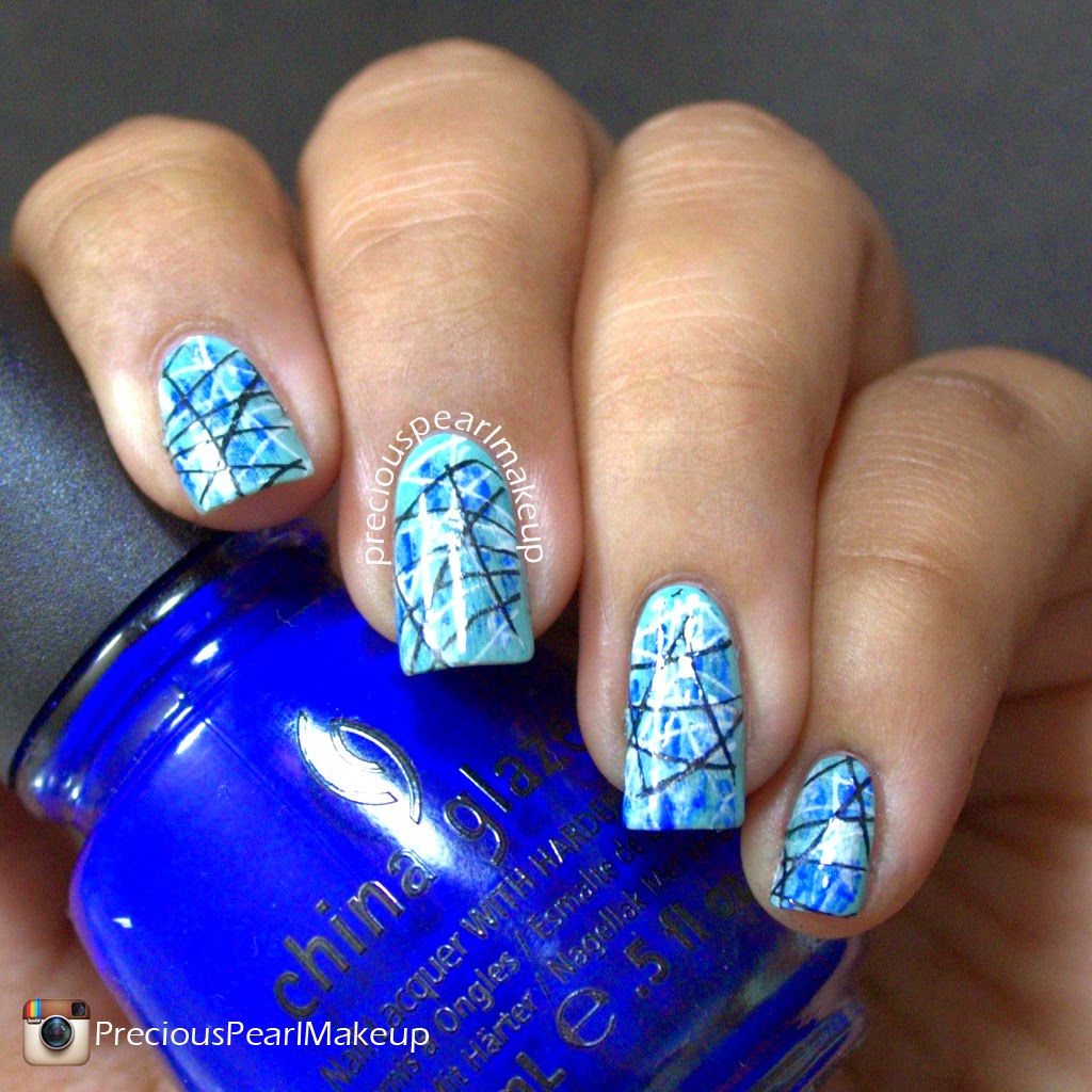 preciouspearlmakeup Blue Abstract Nails