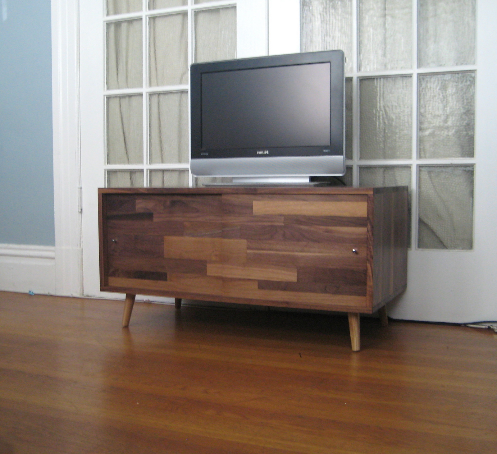 As The Saw Blade Turns Customizable Media Console w/ Sliding Scrap