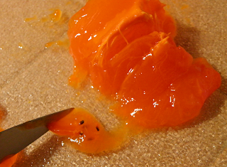Knife Removing Persimmon Seeds