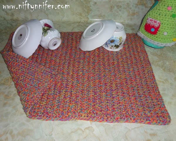 http://www.niftynnifer.com/2014/06/free-crochet-pattern-dish-mat-by.html