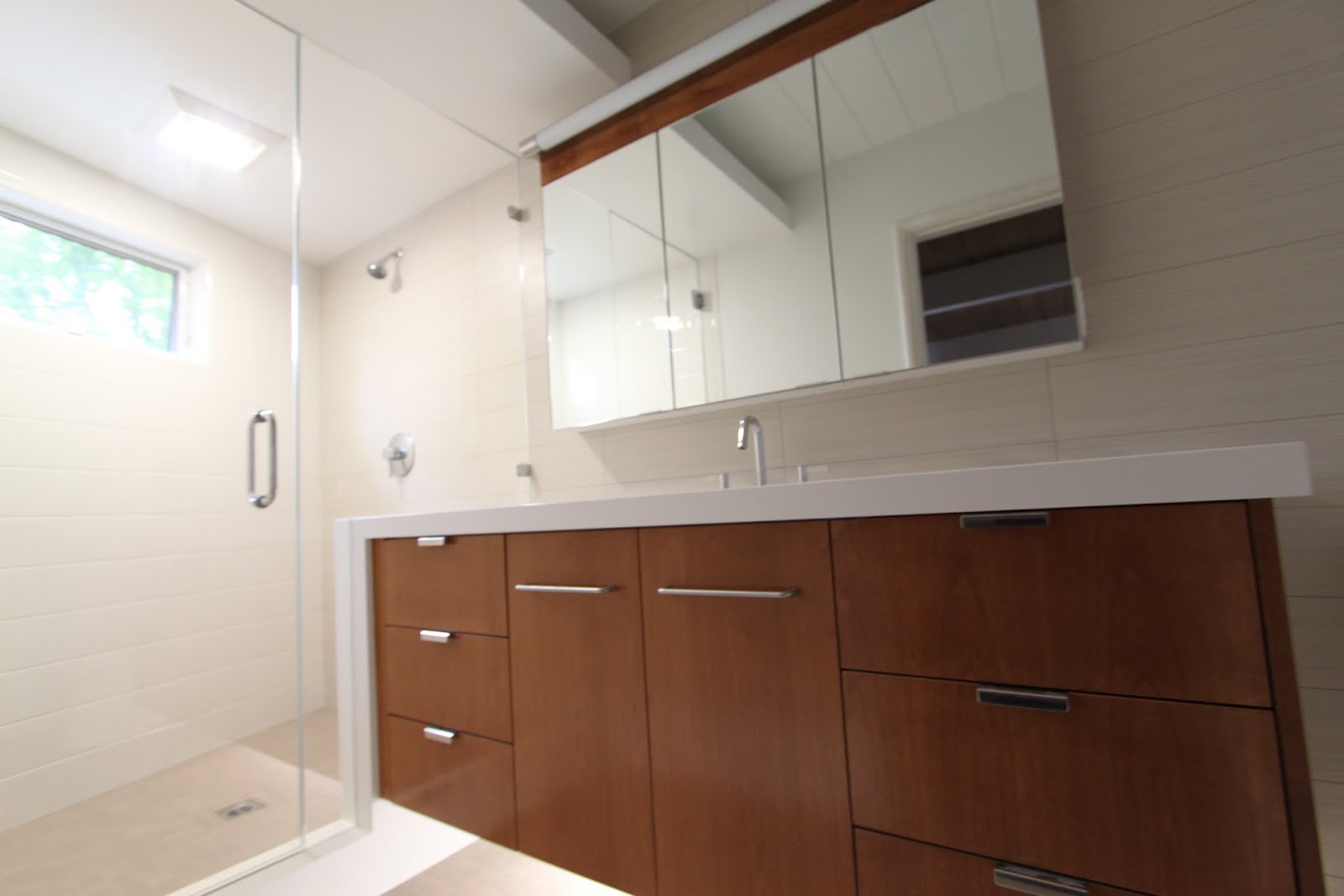 Shower Doors And Paint In Mid Century Modern Bathroom