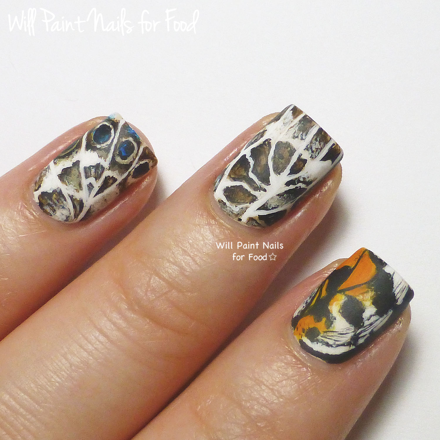 Freehand butterfly nail art