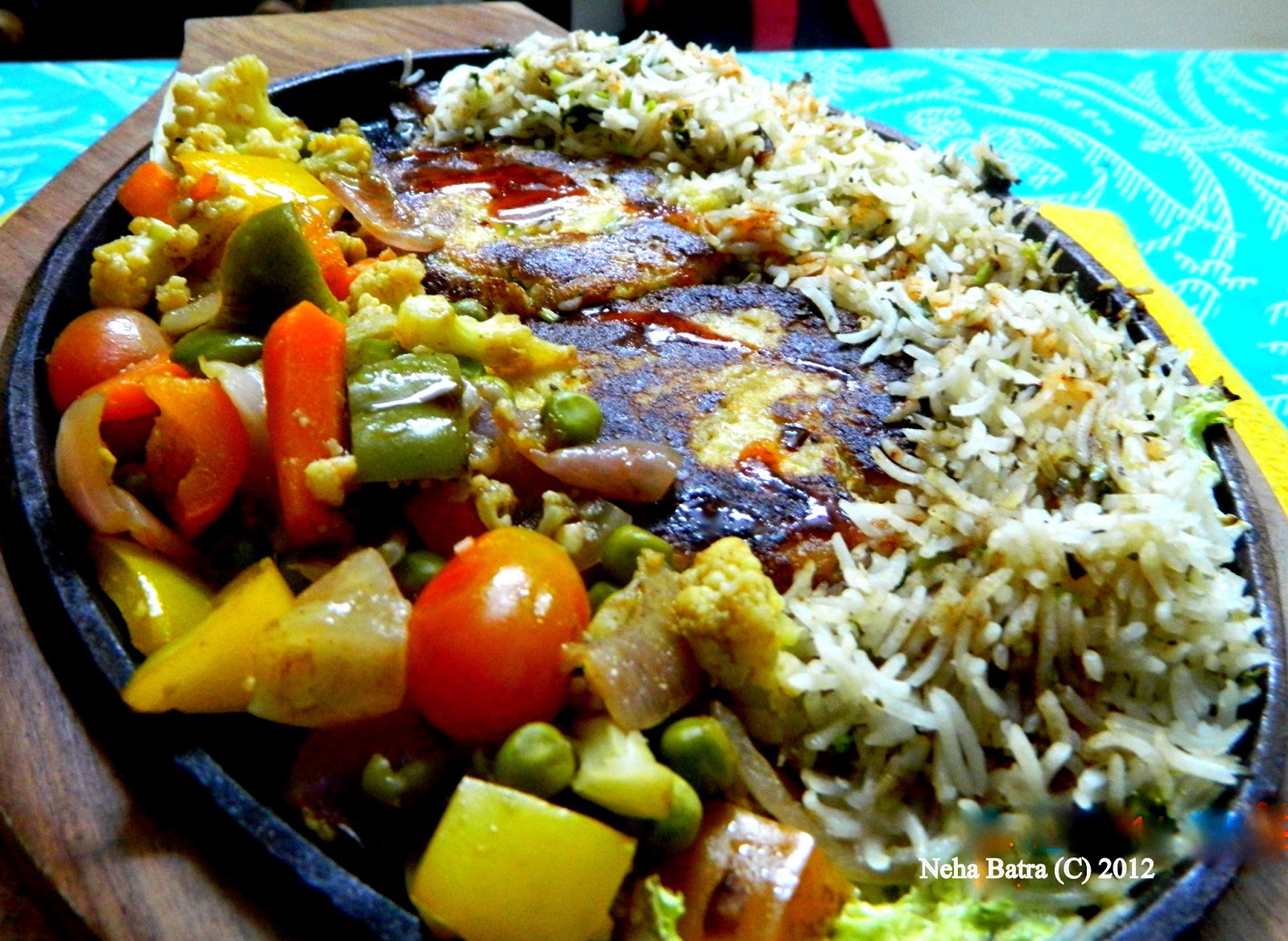 Foodies!!! Cottage cheese sizzlers with Green Rice & Schezwan Sauce