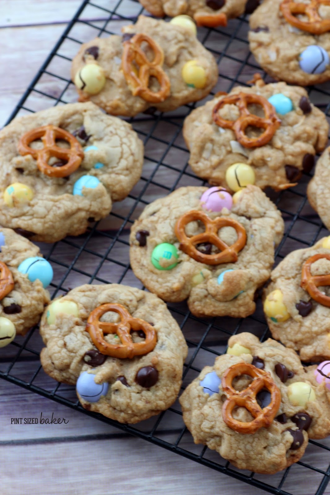 Love sweet and salty? You're gonna love these M and M Pretzel Chocolate Chip Cookies! Easy cookies with salty pretzel M&M's and a pretzel on top!