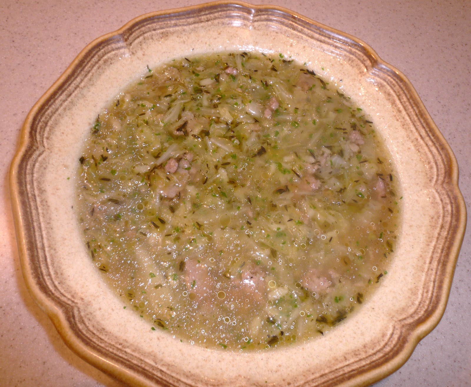 KITCHEN EXCURSIONS Savoy Cabbage Soup with Sausage and Arborio Rice