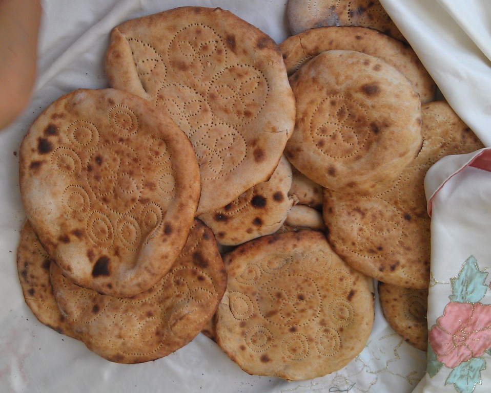 The Art of Uzbek Cuisine Tandir non (Bread baked in a special clay oven)