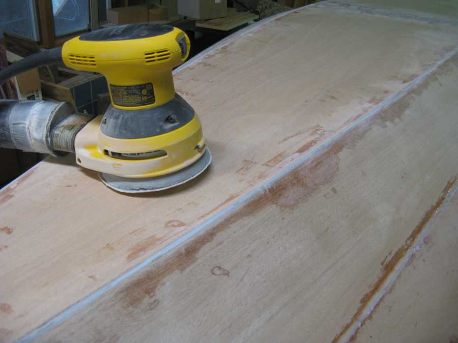 Building a Northeaster Dory Sanding planks at transom