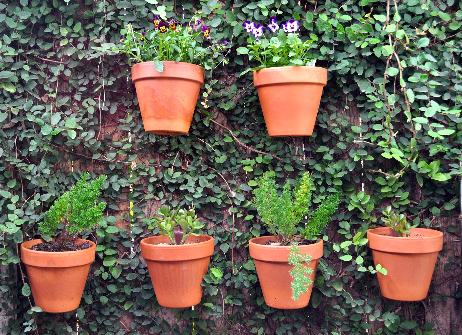 Vertical Gardener HangAPots use these inexpensive, invisible